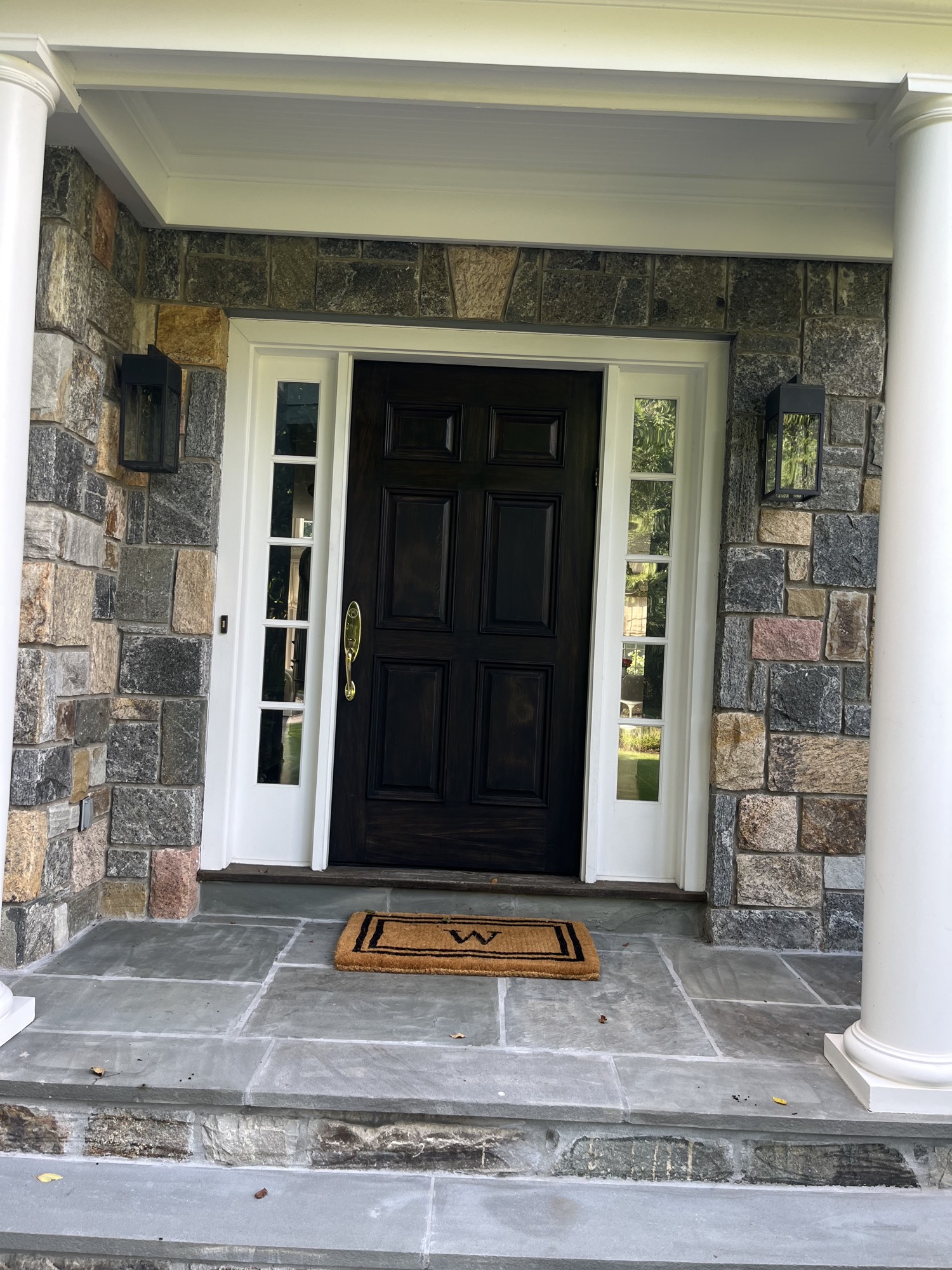 Custom stained front entry door with sidelights built by A&B Inside Carpentry